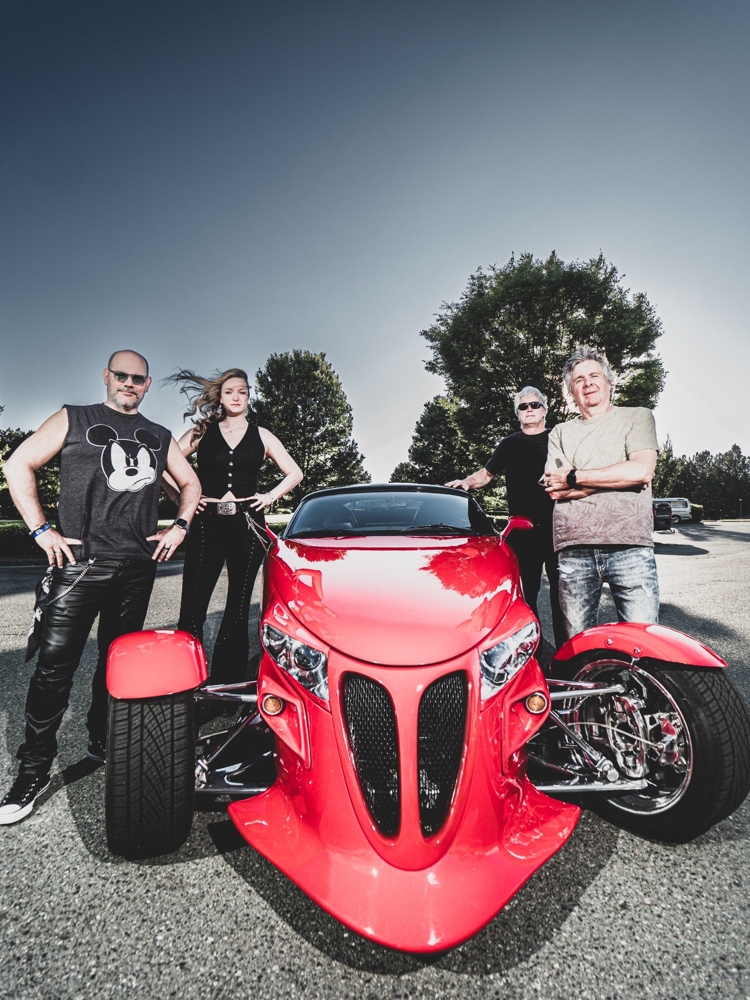 BURNOUT band photo with red roadster front view