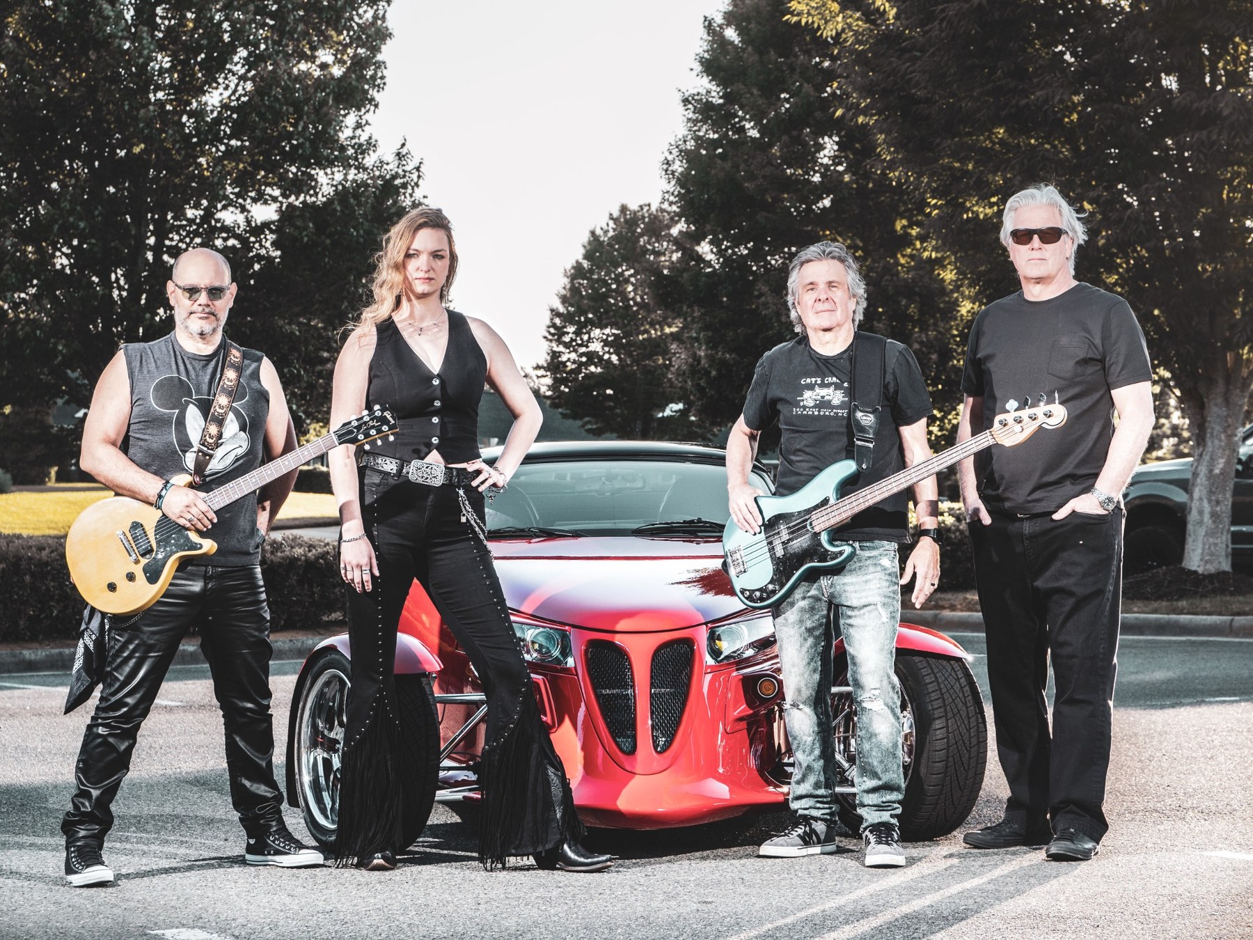 BURNOUT band lineup with red roadster